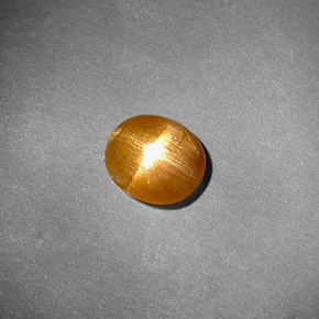 0.81克拉天然棕色星光日光石，椭圆形切割，7.3×6.4毫米，不透明