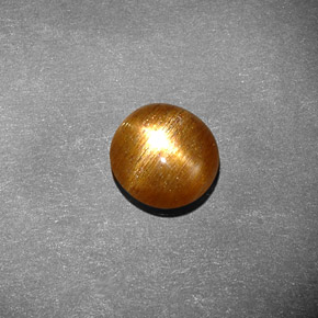 1.17克拉天然棕色星光日光石，椭圆形切割，8×7.6毫米，不透明