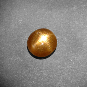 1.17克拉天然棕色星光日光石，椭圆形切割，8×7.6毫米，不透明