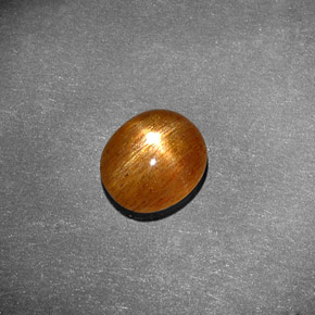 1.13克拉天然棕色星光日光石，椭圆形切割，8.2×7.1毫米，不透明