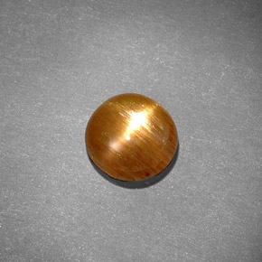 0.97克拉天然棕色星光日光石，椭圆形切割，7.4×7.2毫米，不透明