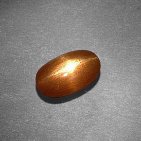 1.53克拉天然棕色星光日光石，椭圆形切割，9.3×5.8毫米，不透明