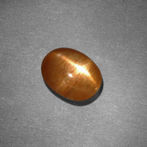 1.30克拉天然棕色星光日光石，椭圆形切割，8.3×6.5毫米，不透明