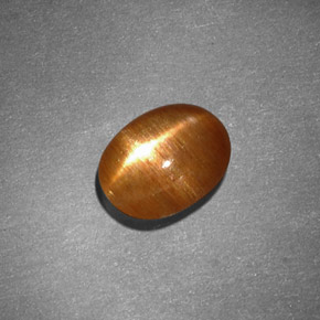 1.30克拉天然棕色星光日光石，椭圆形切割，8.3×6.5毫米，不透明