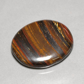 53.09克拉天然多色Tiger's Eye Matrix，椭圆形切割，31×26.7毫米，不透明