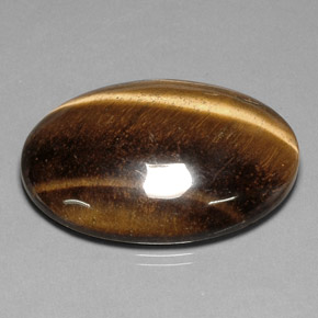 78.03克拉天然棕色Tiger's Eye，椭圆形切割，40.7×30.7毫米，不透明