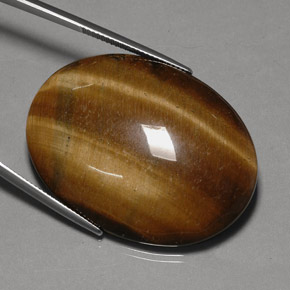 75.77克拉天然棕色Tiger's Eye，椭圆形切割，40×29.9毫米，不透明