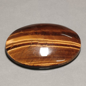 74.22克拉天然棕色Tiger's Eye，椭圆形切割，39.9×30毫米，不透明