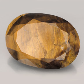 23.17克拉天然棕色Tiger's Eye，椭圆形切割，22.6×16.2毫米，不透明