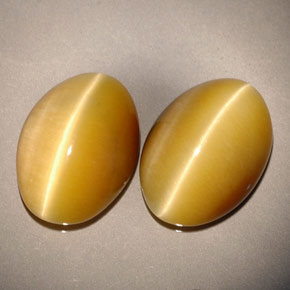 天然黄色Tiger's Eye，椭圆形切割，13.8×9.8毫米，不透明