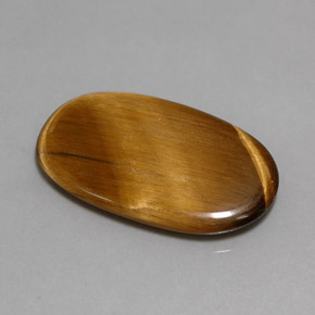 10.07克拉天然棕色Tiger's Eye，椭圆形切割，24.4×14.6毫米，不透明