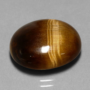 11.35克拉天然棕色Tiger's Eye，椭圆形切割，17.2×14.5毫米，不透明