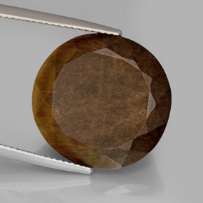 20.85克拉天然棕色Tiger's Eye，椭圆形切割，19.3×18.5毫米，不透明