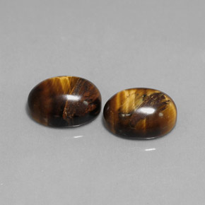 天然棕色Tiger's Eye，椭圆形切割，9.1×7.1毫米，不透明