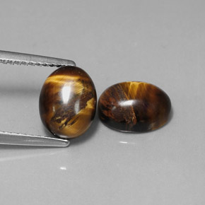 天然棕色Tiger's Eye，椭圆形切割，9.1×7.1毫米，不透明