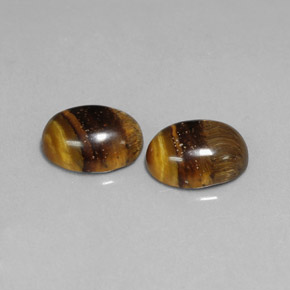 天然棕色Tiger's Eye，椭圆形切割，8.9×6.8毫米，不透明