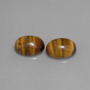 天然棕色Tiger's Eye，椭圆形切割，8.8×6.9毫米，不透明