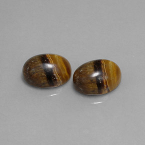 天然棕色Tiger's Eye，椭圆形切割，8.9×7毫米，不透明
