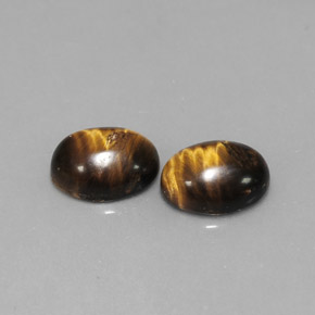 天然棕色Tiger's Eye，椭圆形切割，8.8×6.9毫米，不透明