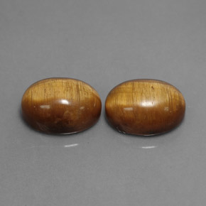 天然棕色Tiger's Eye，椭圆形切割，8.9×6.9毫米，不透明