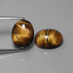 天然棕色Tiger's Eye，椭圆形切割，9×7毫米，不透明