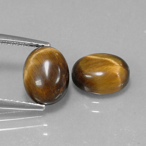天然棕色Tiger's Eye，椭圆形切割，9×7毫米，不透明