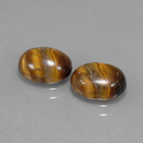 天然棕色Tiger's Eye，椭圆形切割，8.9×6.8毫米，不透明