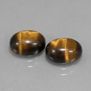 天然棕色Tiger's Eye，椭圆形切割，9.1×7.1毫米，不透明