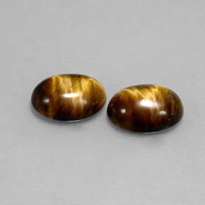 天然棕色Tiger's Eye，椭圆形切割，8.6×6.6毫米，不透明