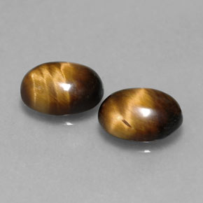 天然棕色Tiger's Eye，椭圆形切割，8.7×6.8毫米，不透明