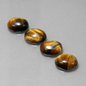 天然棕色Tiger's Eye，椭圆形切割，8.9×6.9毫米，不透明