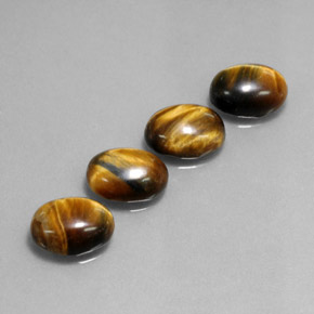天然棕色Tiger's Eye，椭圆形切割，8.9×6.9毫米，不透明