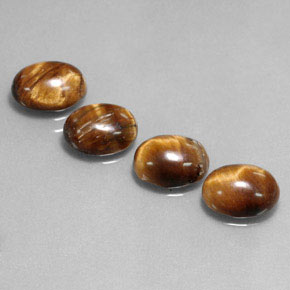 天然棕色Tiger's Eye，椭圆形切割，8.8×6.9毫米，不透明