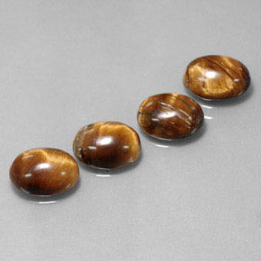 天然棕色Tiger's Eye，椭圆形切割，8.8×6.9毫米，不透明