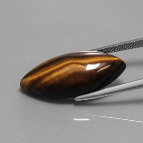 13.03克拉天然棕色Tiger's Eye，马眼形，24.8×12.1毫米，不透明