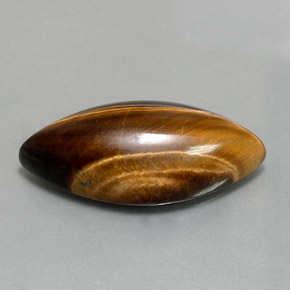 12.99克拉天然棕色Tiger's Eye，马眼形，24.8×12毫米，不透明