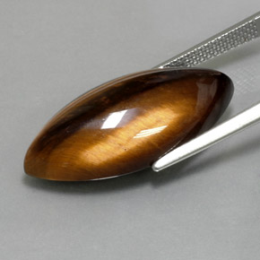 13.60克拉天然棕色Tiger's Eye，马眼形，25×12.2毫米，不透明