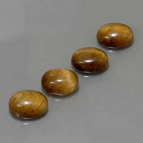 天然棕色Tiger's Eye，椭圆形切割，8.9×6.9毫米，不透明