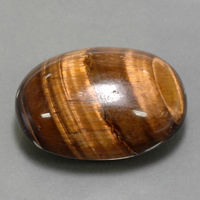 24.80克拉天然棕色Tiger's Eye，椭圆形切割，21.7×16.8毫米，不透明