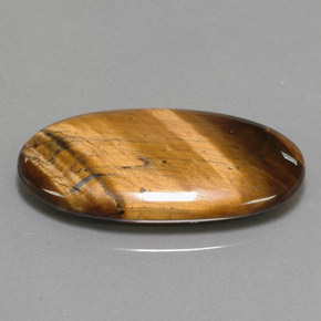 14.24克拉天然棕色Tiger's Eye，椭圆形切割，27.9×14.7毫米，不透明