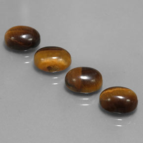 天然棕色Tiger's Eye，椭圆形切割，9×7毫米，不透明