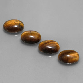 天然棕色Tiger's Eye，椭圆形切割，8.8×6.9毫米，不透明