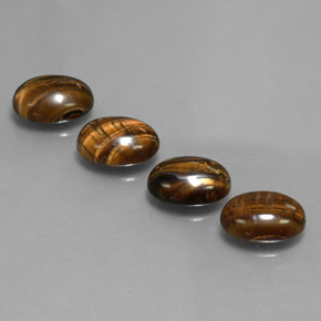 天然棕色Tiger's Eye，椭圆形切割，8.7×6.7毫米，不透明