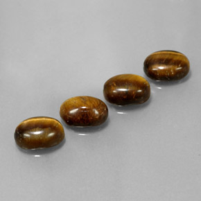 6.65天然棕色Tiger's Eye，椭圆形切割，8.8×6.8毫米，不透明