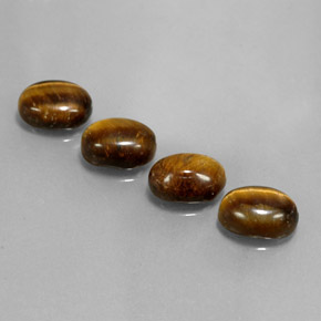6.65天然棕色Tiger's Eye，椭圆形切割，8.8×6.8毫米，不透明