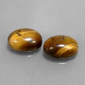 天然棕色Tiger's Eye，椭圆形切割，9×7.1毫米，不透明