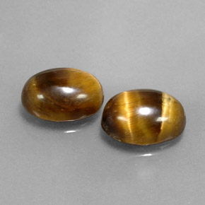天然棕色Tiger's Eye，椭圆形切割，9×6.9毫米，不透明