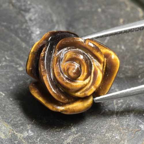 10.21克拉天然棕色Tiger's Eye，花形切工，16×14.9毫米，不透明