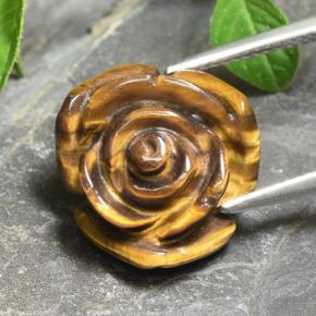 11.12克拉天然棕色Tiger's Eye，花形切工，15.7×15毫米，不透明