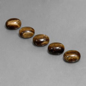 10.03天然棕色Tiger's Eye，椭圆形切割，9×7毫米，不透明